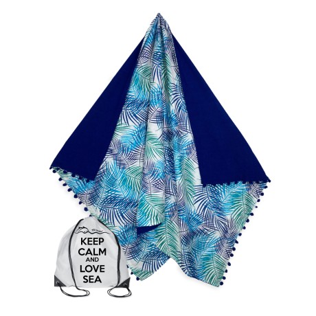 beach towel printed with leaves on blue