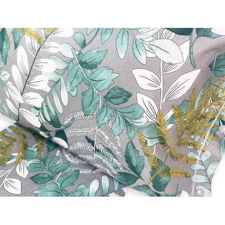 Drap de flanelle avec des feuilles sur fond vert