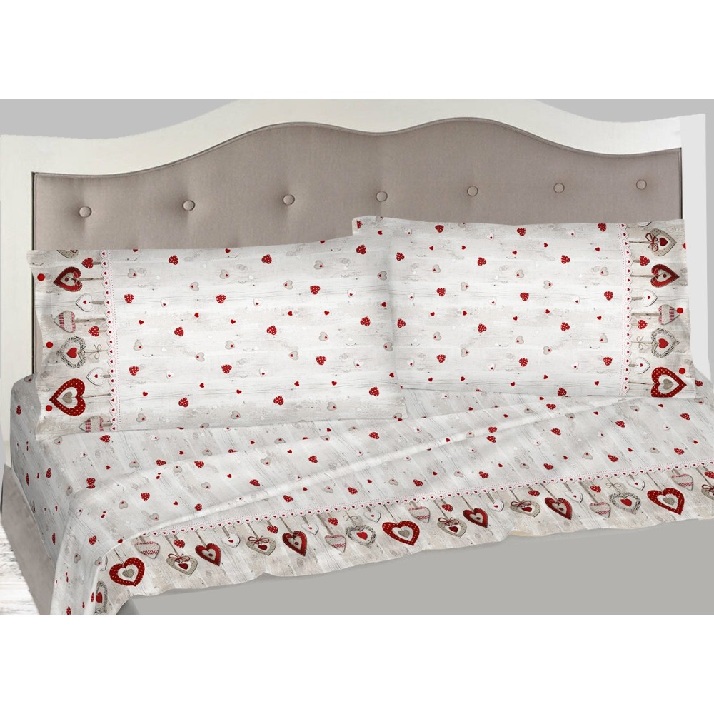 Juego de cama de franela estampado con corazones sobre rojo