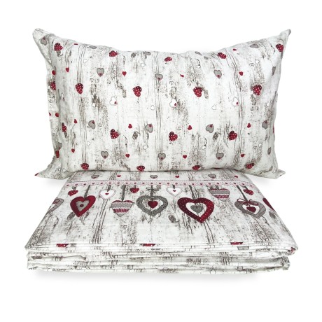 Juego de cama de franela estampado con corazones sobre rojo