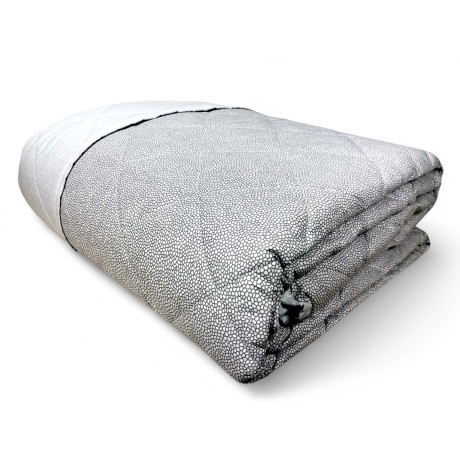 Colcha acolchada sobre gris