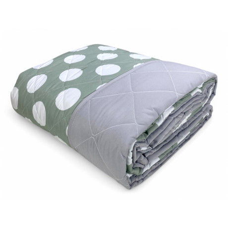 Colcha acolchada de lunares verdes – Diseño moderno con lunares blancos sobre un fondo verde salvia