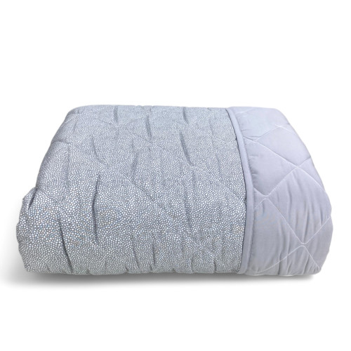 Détail en tissu de couvre-lit matelassé - micro-coutures et coutures en losange