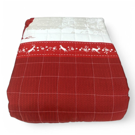 Gesteppte Tagesdecke mit Waldszene und stilisiertem schwarzem Hirsch
