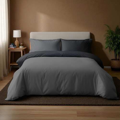 Focus sur les ouvertures de la housse de couette Duotto anthracite et noir pour une insertion pratique et rapide de la couette.