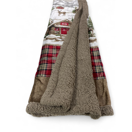 Détail du dos en cuir d’agneau effet taupe doux du plaid Chalet
