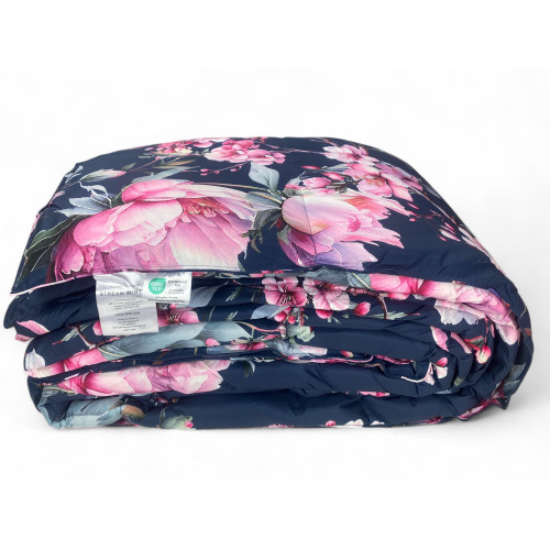 Trapunta matrimoniale Stream 500 gr - dettaglio tessuto floreale blu e rosa elegante e soffice
